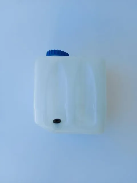Windshield washer/ chain lubricant reservoir